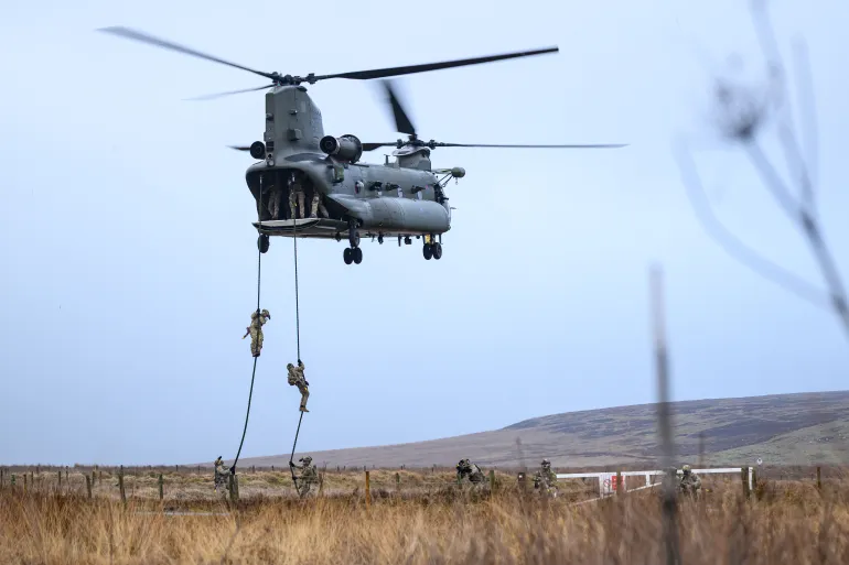 OTTERBURN, UNITED KINGDOM - JANUARY 31: Members of the Special Operations Forces fast rope from a Mk.6 CH47 Chinook helicopter during a validation exercise on January 31, 2026 in Otterburn, United Kingdom. The training exercise involves members of the UK Special Operations Forces from the British Army, Royal Air Force and Royal Marines, and is designed to demonstrate operational readiness of the joint rapid-reaction forces. The successful completion of Exercise Hyperion Storm validates the UK's integration with the NATO Allied Reaction Force (ARF), part of the multinational military alliance ready to deploy in response to global security concerns. (Photo by Leon Neal/Getty Images)